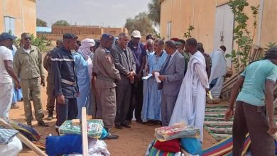 صورة توزيع مواد غذائية و أفرشة على المتضررين من الأمطار في مدينة بوكى 